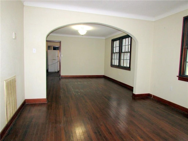 3701 Elysian Fields Ave, New Orleans, LA 70122 - spare room with ornamental molding and dark hardwood / wood-style floors