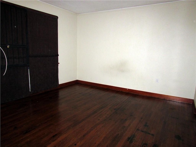3701 Elysian Fields Ave, New Orleans, LA 70122 - unfurnished room with dark wood-type flooring