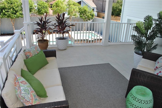 balcony featuring outdoor lounge area and a patio area