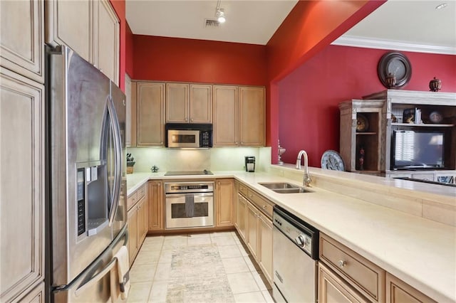 kitchen featuring sink, crown molding, light tile flooring, and stainless steel appliances