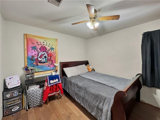 bedroom featuring ceiling fan and light wood-type flooring