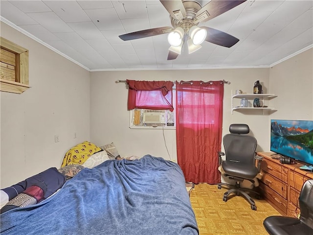 bedroom featuring ceiling fan, crown molding, and light parquet flooring