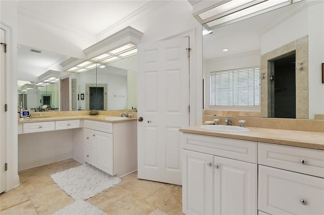 bathroom featuring crown molding, tile flooring, and vanity