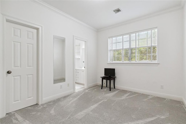 unfurnished room with light colored carpet and ornamental molding