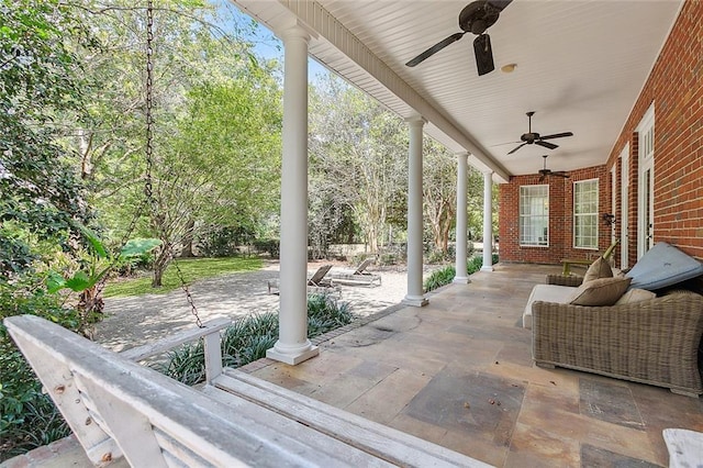 view of patio with ceiling fan