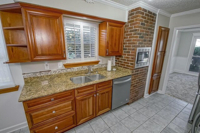 tiled home office with crown molding, a textured ceiling, and ceiling fan