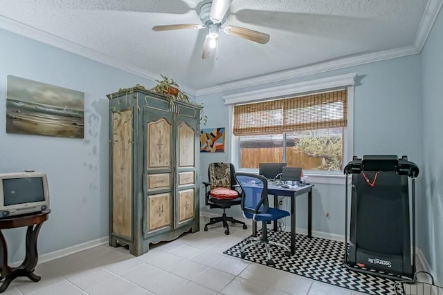 office featuring a ceiling fan, baseboards, ornamental molding, and a textured ceiling