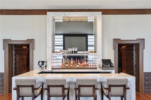 bar featuring wood-type flooring