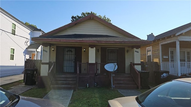 bungalow-style house featuring covered porch