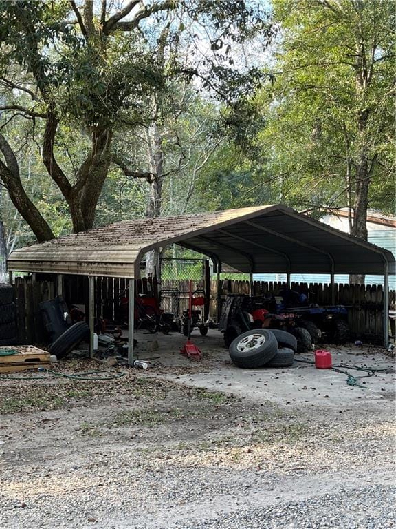 view of parking with a carport