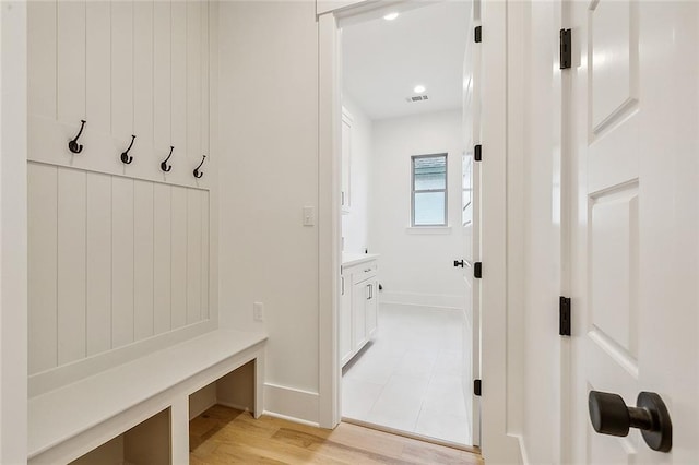 mudroom with light wood-type flooring