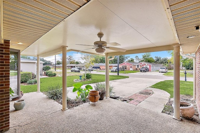 view of patio featuring ceiling fan