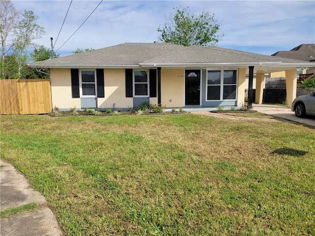 single story home with a front yard