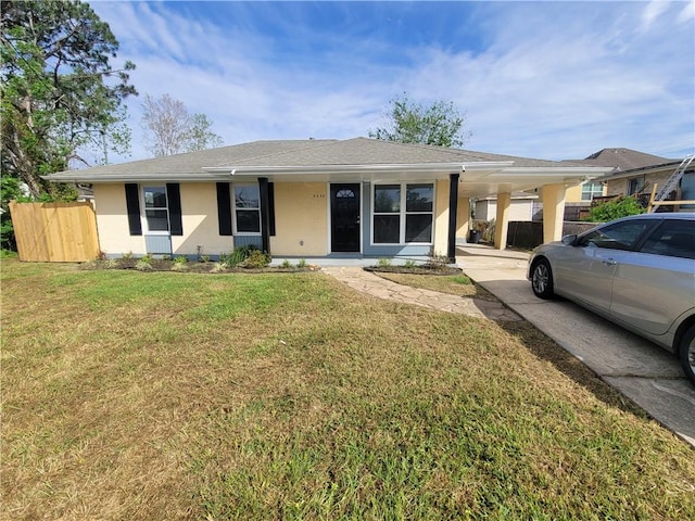 single story home with a front yard