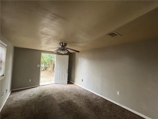 carpeted empty room with ceiling fan