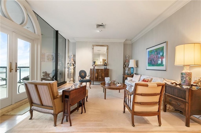 living area with french doors, light hardwood / wood-style flooring, and plenty of natural light