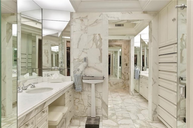 bathroom with vanity and crown molding