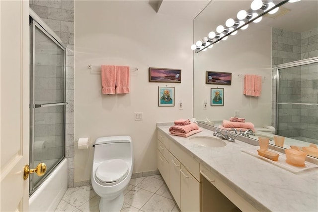 full bathroom with combined bath / shower with glass door, vanity, and toilet