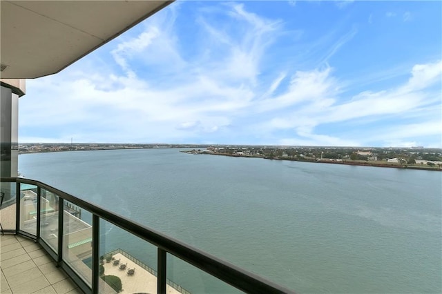 balcony featuring a water view