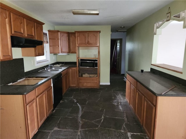 kitchen with dark stone counters, dark tile floors, black appliances, and sink