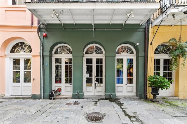 doorway to property with a patio and french doors