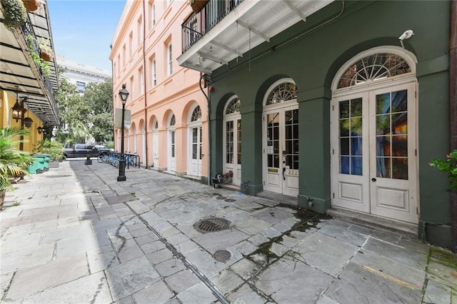 exterior space with french doors and a patio area