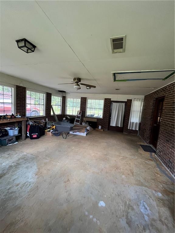 interior space featuring ceiling fan