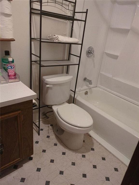 full bathroom featuring shower / tub combination, vanity, and toilet