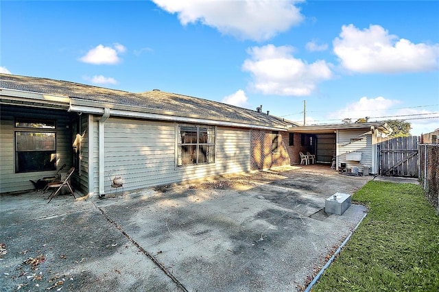 back of house featuring a patio