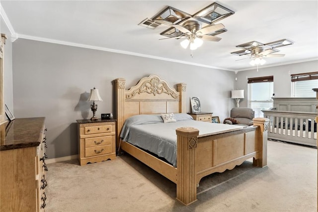 bedroom featuring ceiling fan, light carpet, and ornamental molding