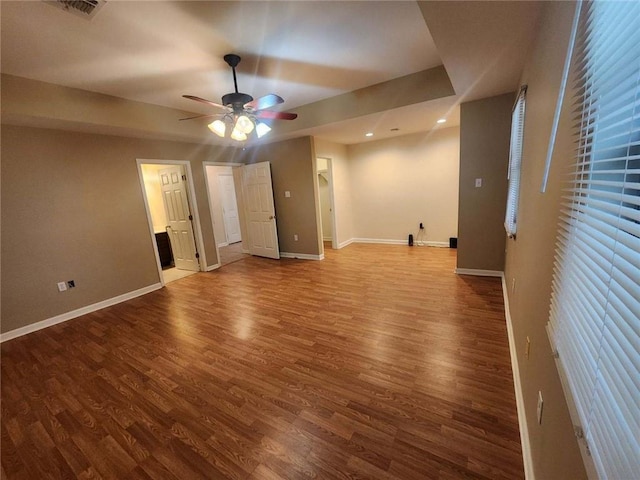 interior space featuring hardwood / wood-style floors and ceiling fan