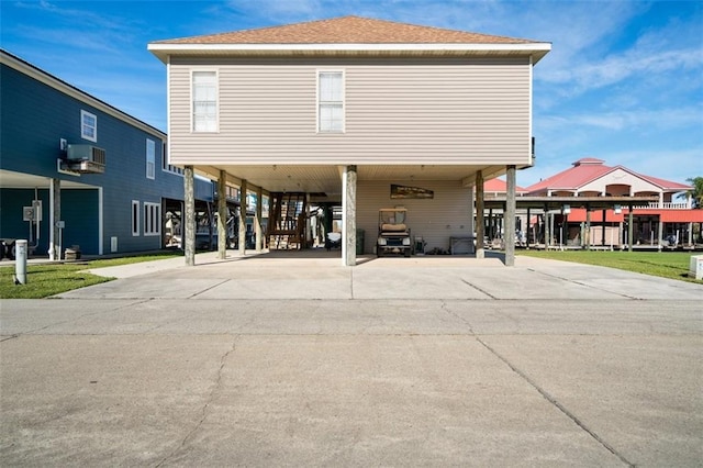 exterior space with a carport