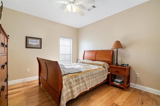 bedroom with light wood-type flooring and ceiling fan