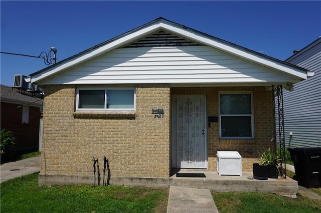 bungalow with central AC unit