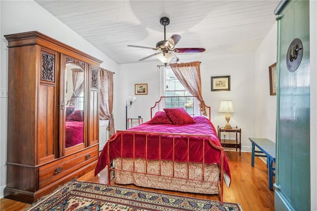 bedroom featuring ceiling fan and light wood-type flooring