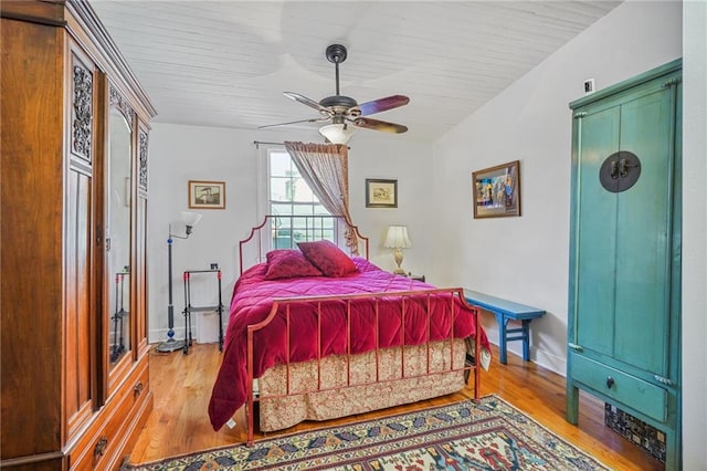 bedroom featuring ceiling fan and light hardwood / wood-style floors