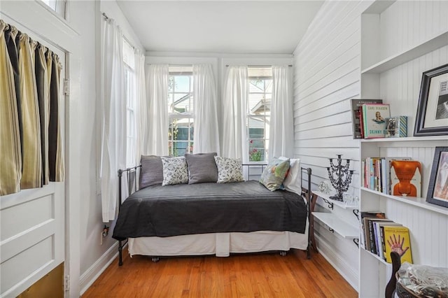 bedroom with light wood-type flooring