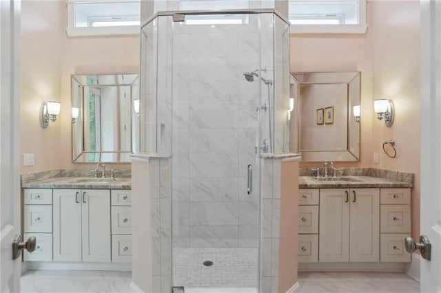 bathroom with oversized vanity, dual sinks, and tile flooring