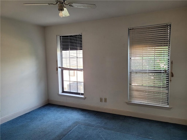 carpeted empty room with ceiling fan