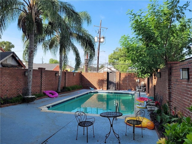 view of pool with a patio area