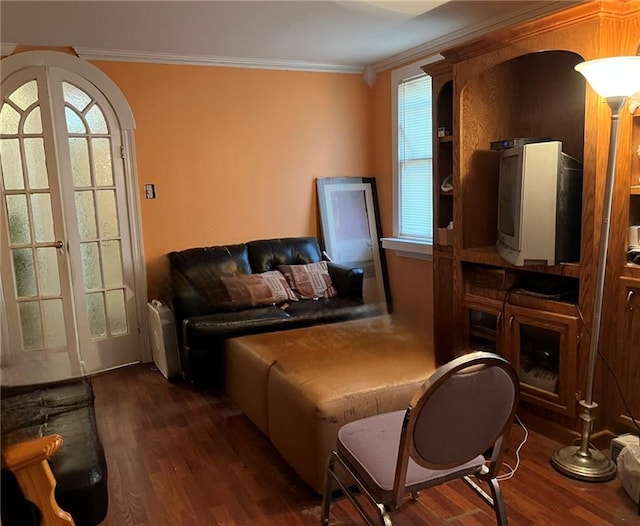 interior space featuring crown molding, french doors, and dark wood-type flooring