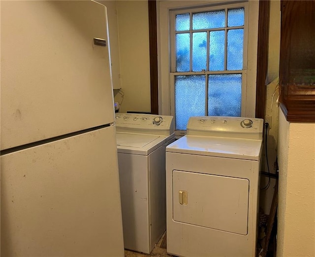 laundry area featuring separate washer and dryer