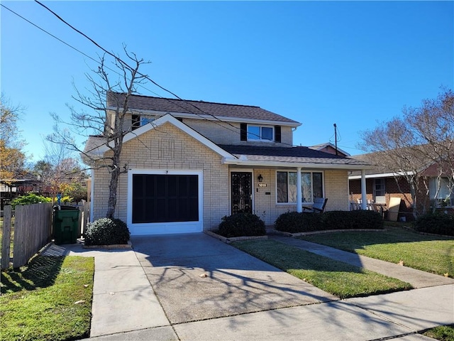 front of property with a front yard and a garage