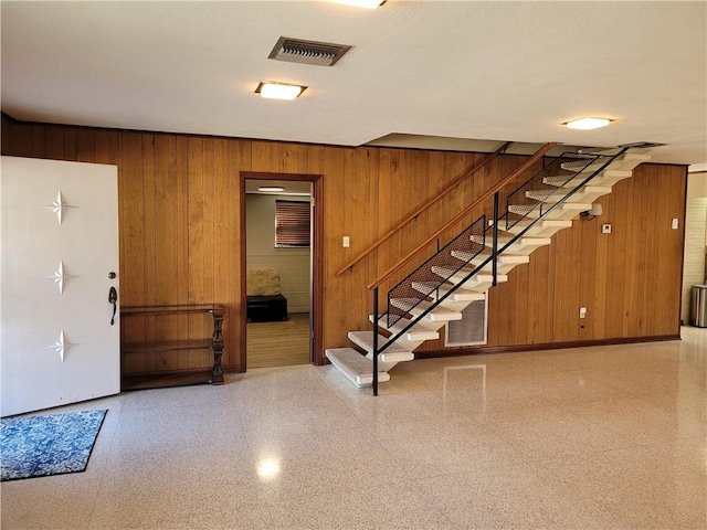 basement with wood walls