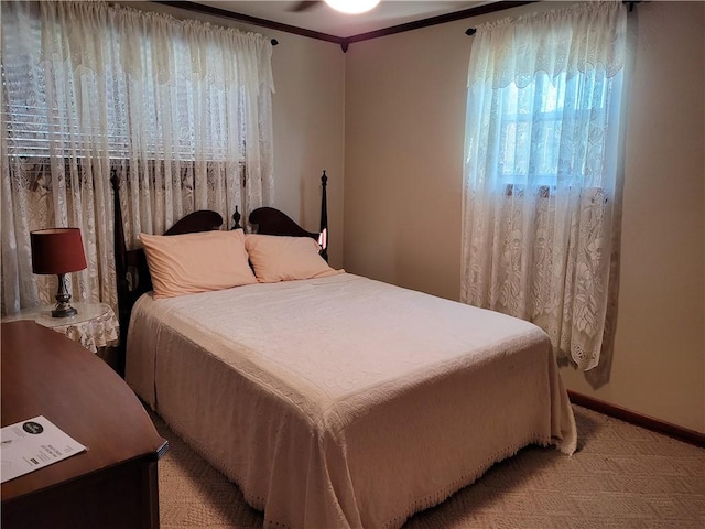 bedroom featuring crown molding