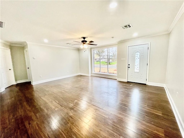 foyer entrance with ceiling fan, ornamental molding, and dark hardwood / wood-style floors