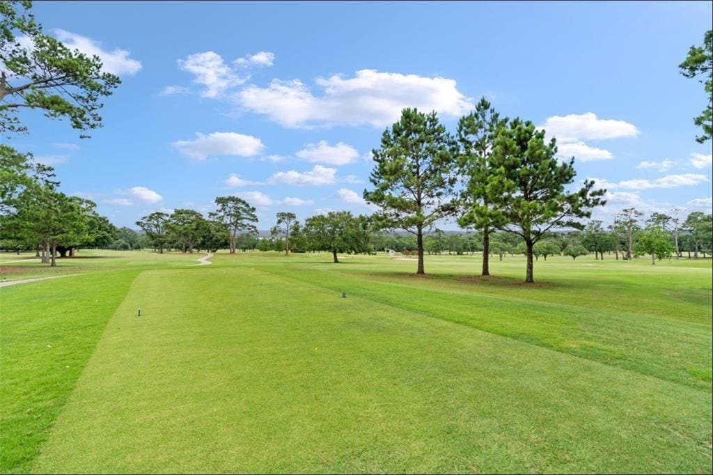 66 Thunderbird Dr, Covington, LA 70433 - view of home's community with a yard and view of golf course