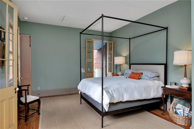 bedroom featuring light hardwood / wood-style floors