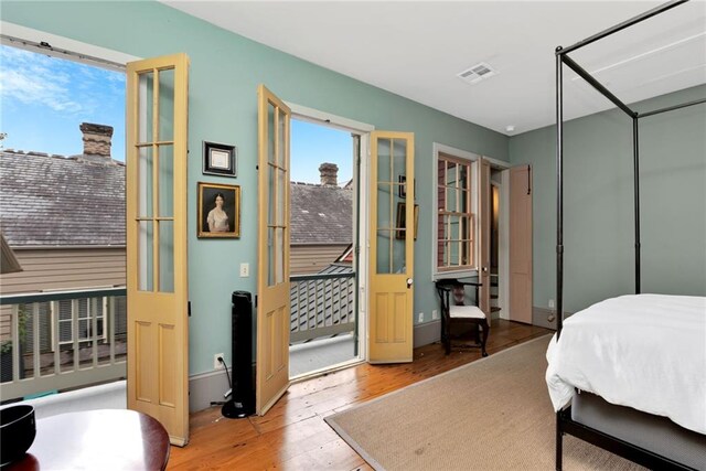 bedroom with light wood-type flooring