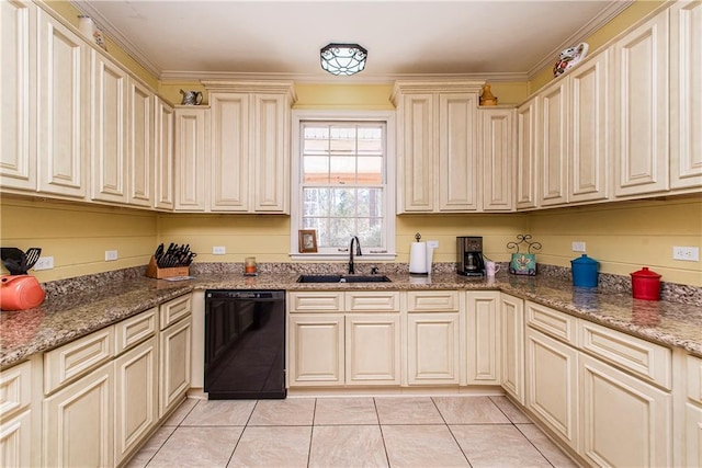 kitchen with light tile patterned floors, sink, stone countertops, cream cabinets, and black dishwasher